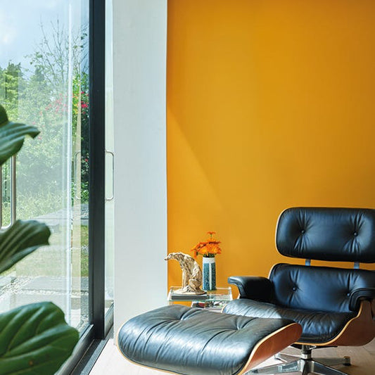 Intérieur peint avec Farrow & Ball Dutch Orange, orange lumineux et solaire