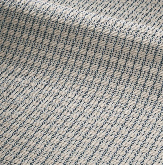 Zoom sur le motif géométrique jacquard du tissu Jalouses colorées