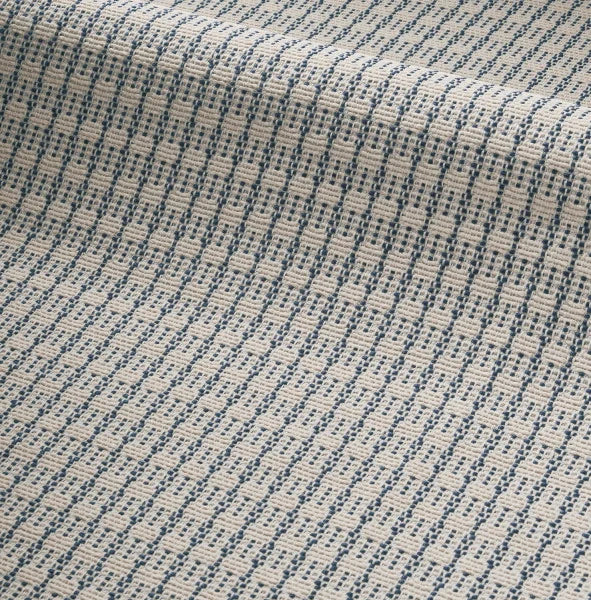 Zoom sur le motif géométrique jacquard du tissu Jalouses colorées